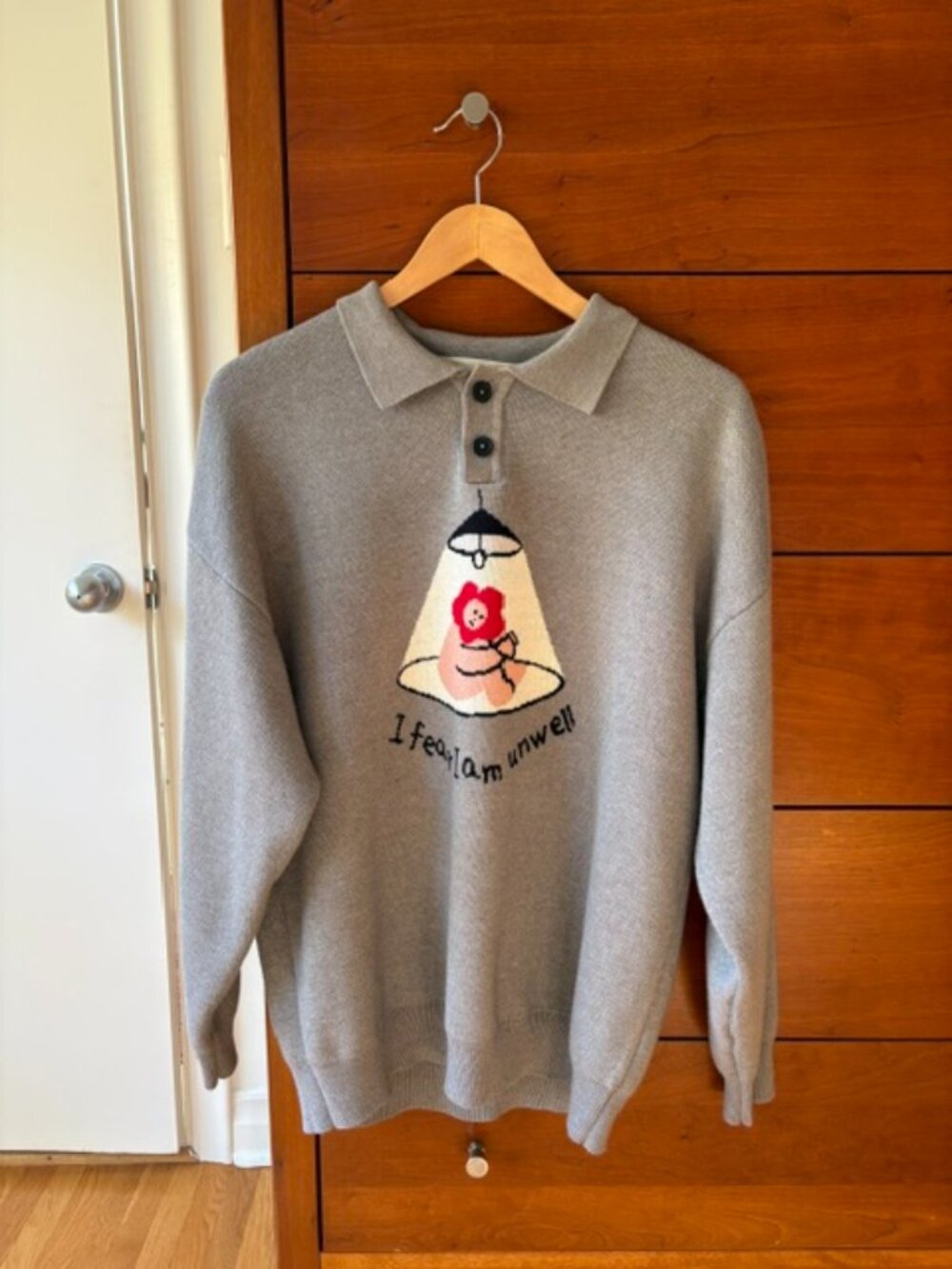 Kina & Tam “Unwell” sweater